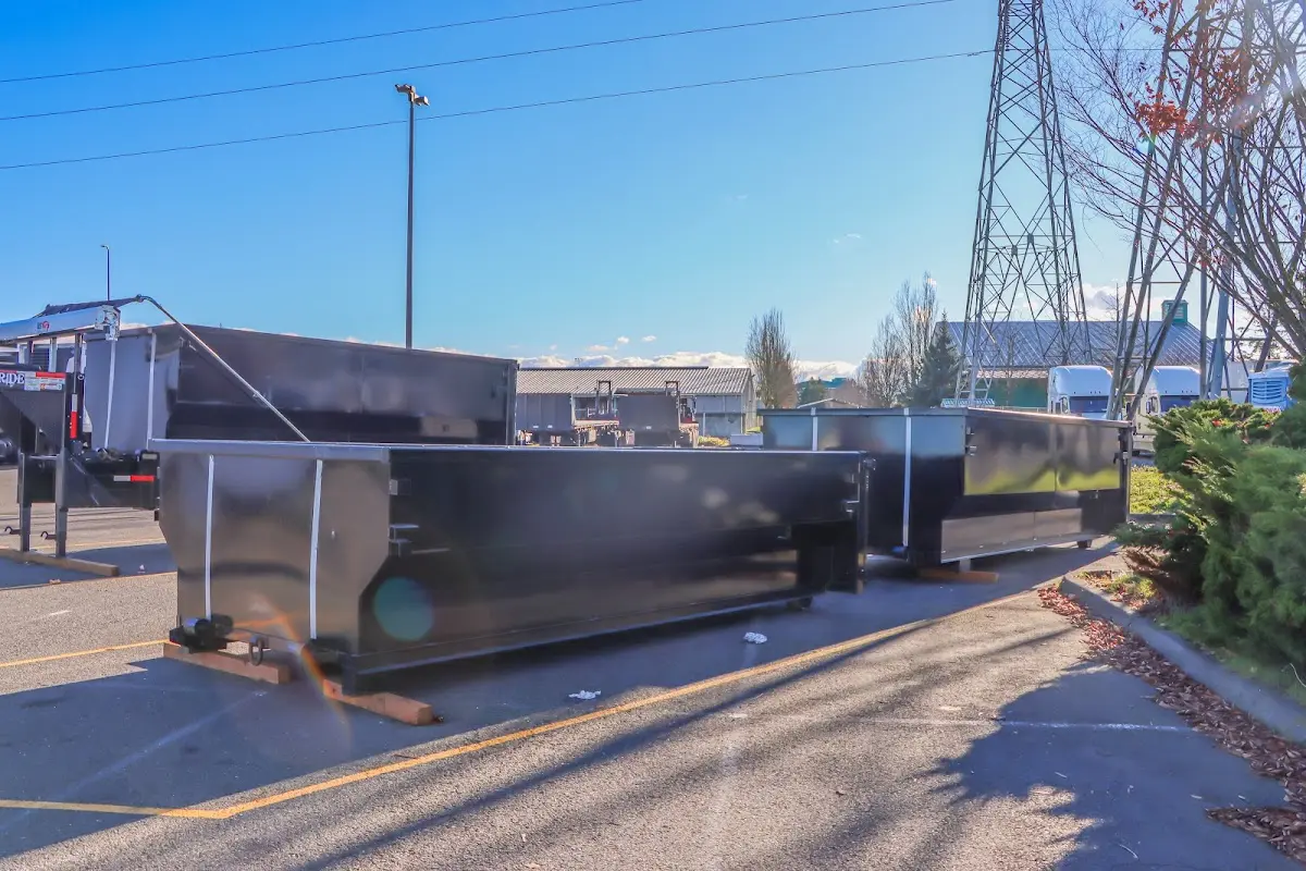 Roll-off dumpster ready for waste disposal at job site for Cleanout Dumpster Rental in Nellis AFB